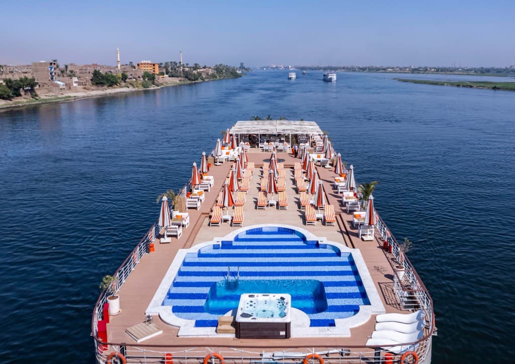 Sun deck with pool and orange loungers